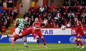 Celtic's Johnny Kenny (left) scores their side's fourth goal of a 5-1 win against Aberdeen at Pittodrie.
