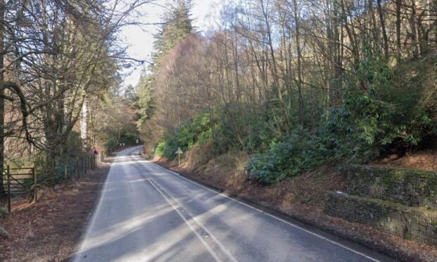 A82 at Altura with trees along both sides of the carriageway.