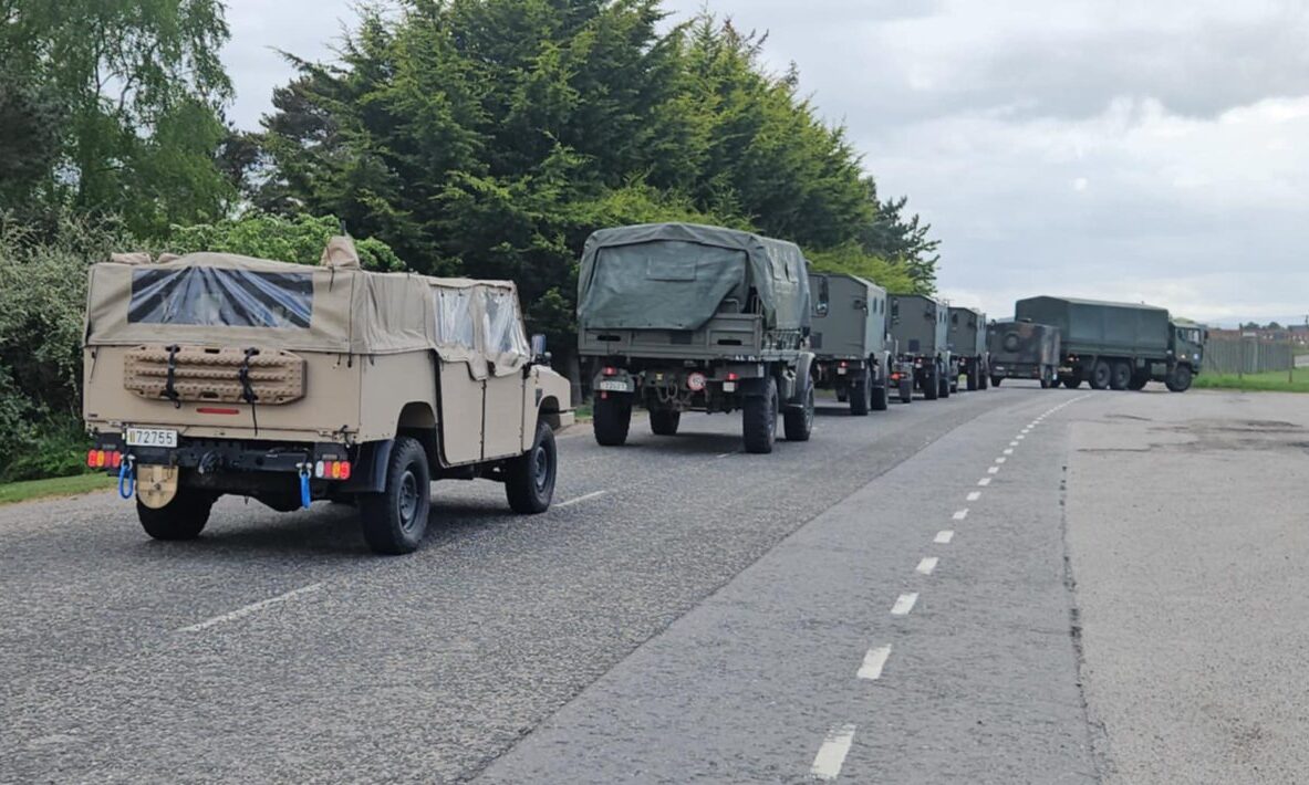 Convoy of vehicles of the Belgian Armed Forces entering the Kinloss Barracks