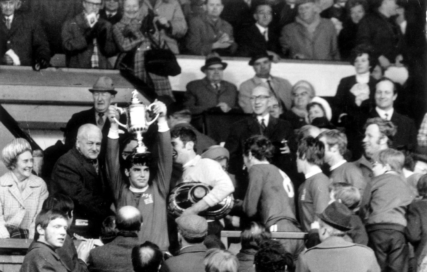 Aberdeen captain Martin Buchan lifts the Scottish Cup after a 3-1 win against Celtic in the final at Hampden. 