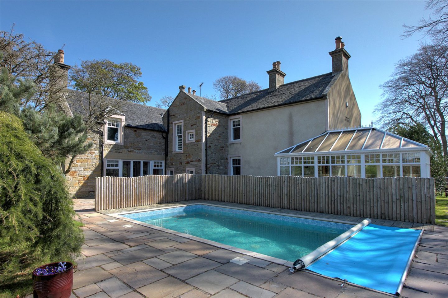 Back of the Moray farmhouse with outdoor heated pool/