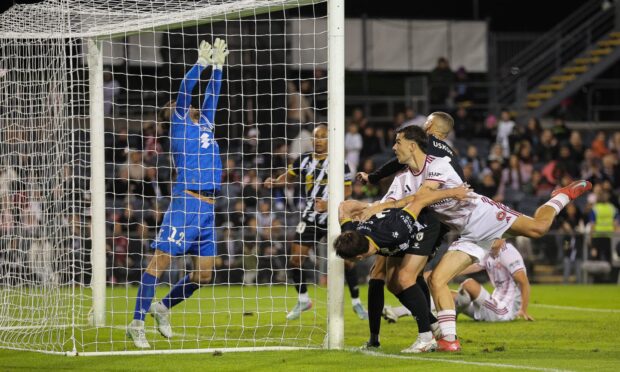 Nicolas Milanovic of Western Sydney Wanderers watches a header rise over the bar against Macarthur FC. Image: Shutterstock.