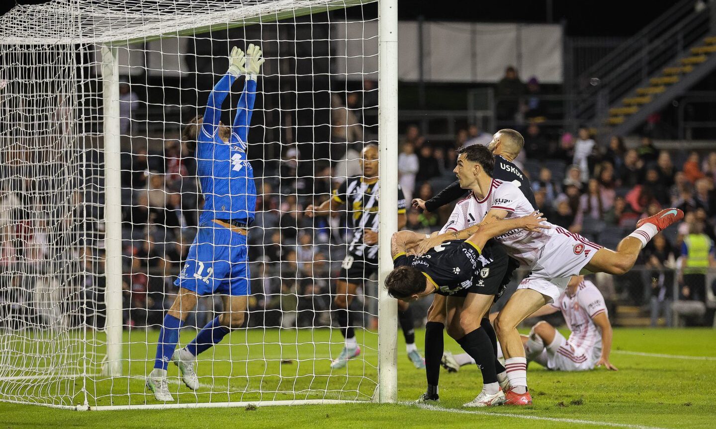 Nicolas Milanovic of Western Sydney Wanderers watches a header rise over the bar against Macarthur FC. Image: Shutterstock.