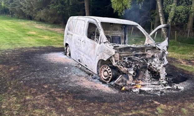 van fire at Elgin Golf course.