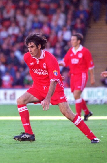 Mike Newell in action for the Dons in 1997.