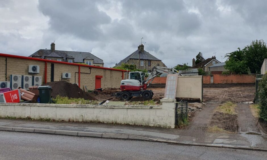 Site of demolished house.