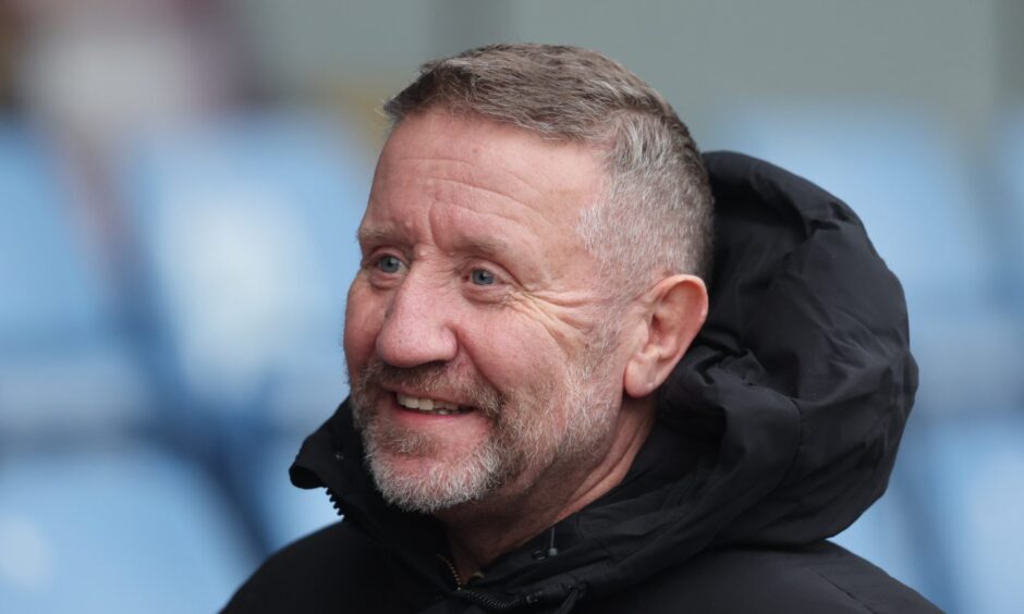 John Robertson ahead of a Ross County game.