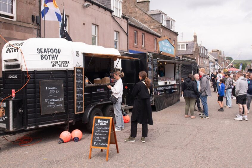 Food vans, including Seafood Bothy and Seasonal Flavour, at the festival.
