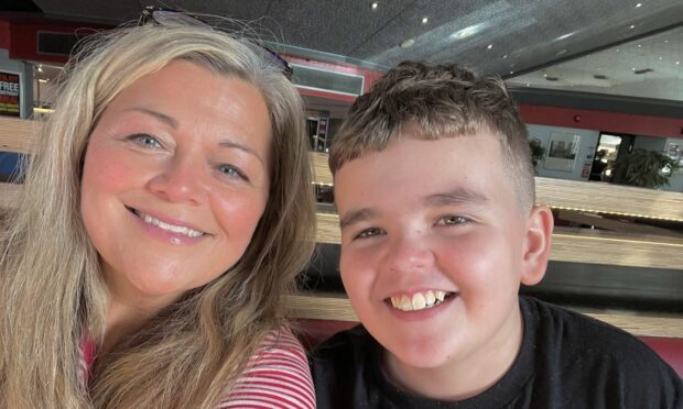 Helen Swan with son Harry. The Stonehaven mum flies to Germany for treatment to combat her aggressive cancer. Image: Supplied