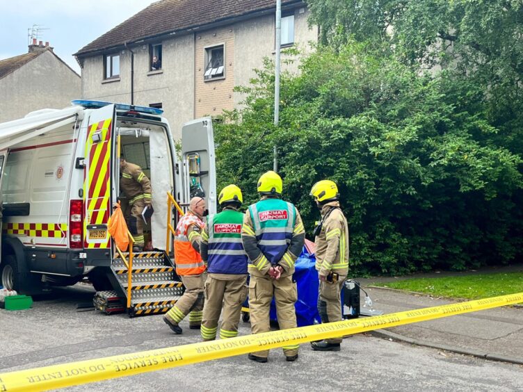 Firefighters at Cadenhead Place.