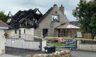 The house destroyed by fire in Durno. The charred rafters still stand.