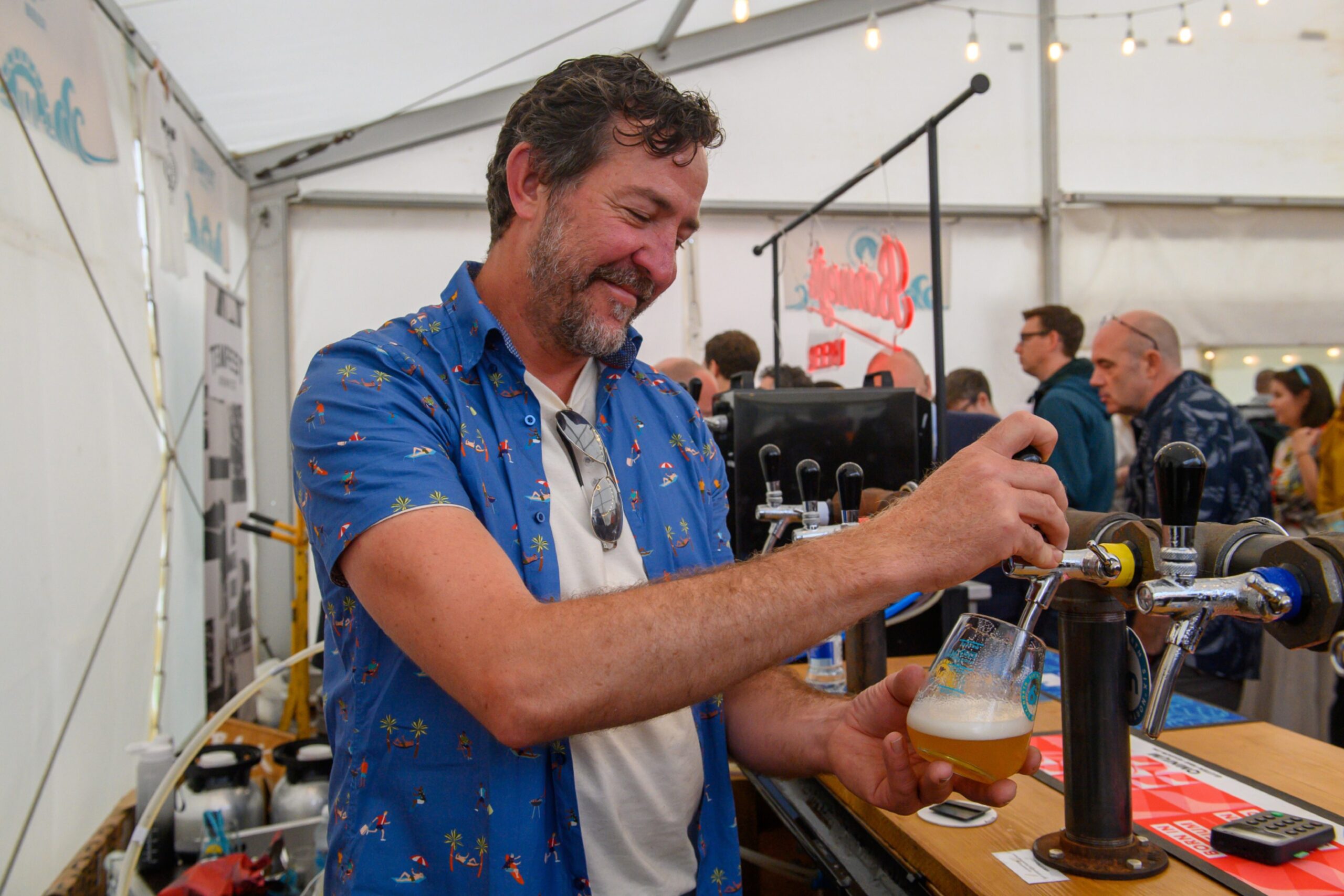 Bartender pouring a draught beer