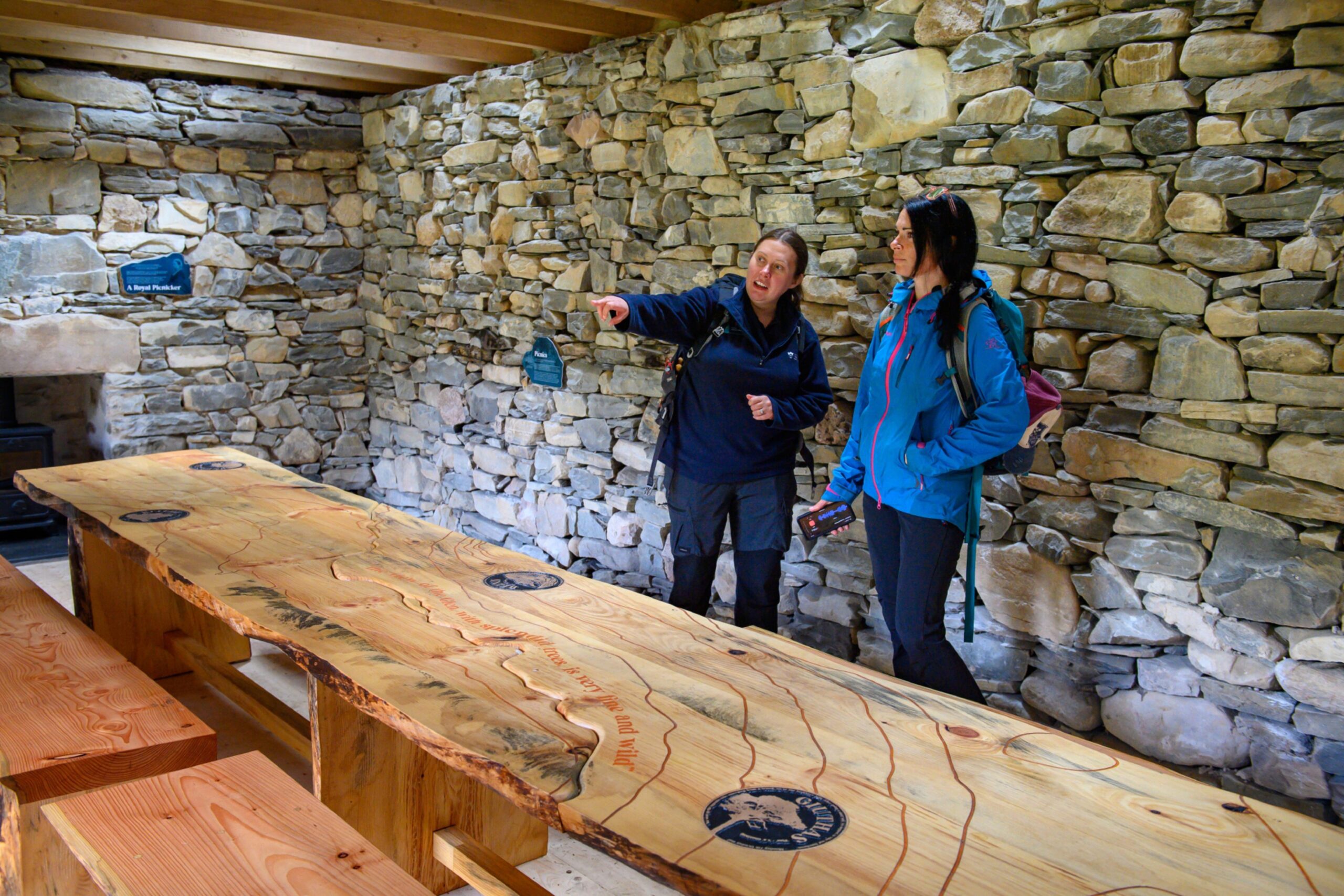 The stunning Scots pine table inside the picnic cottage