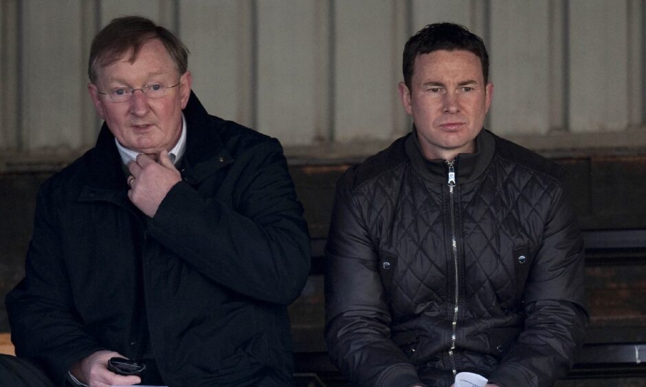 Ross County director of football George Adams, left, and his son, manager of Ross County, pictured at Central Park, Cowdenbeath, on May 12, 2015 at the Cowdenbeath v Brechin City Division One play-off tie.