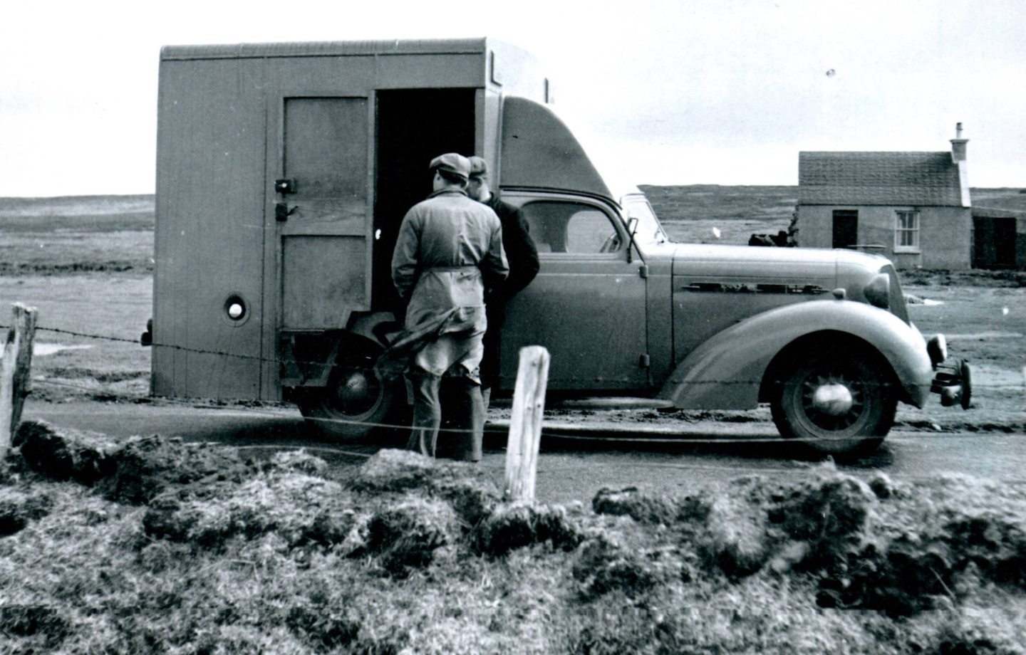 The original banking van in 1946 looks like a hut stuck to the back of a car.