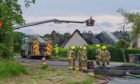 A crane was utilised to help extinguish the flames. Image: Jasperimage