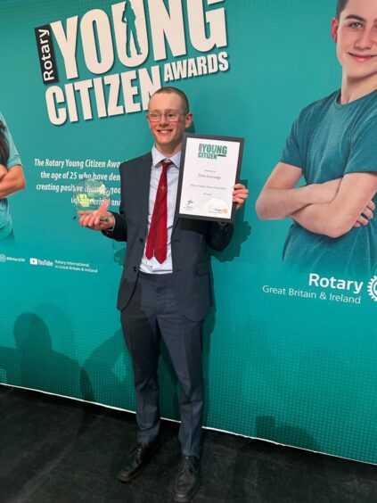 Torin receives his award for supporting suicide prevention