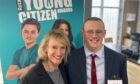 Torin Liversedge with mum Kerry and his national award. The 17-year-old has caught attention for his fundraising efforts. Image: Rotary Club