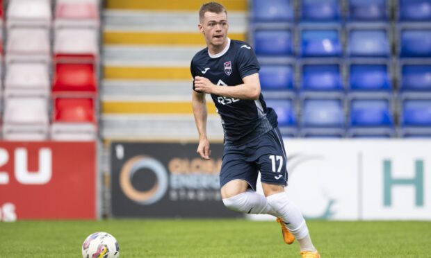 Ross County's Jay Henderson in action.