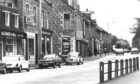 1977: Cars parked along North Deeside Road in Cults on a quiet June day. Image: DC Thomson