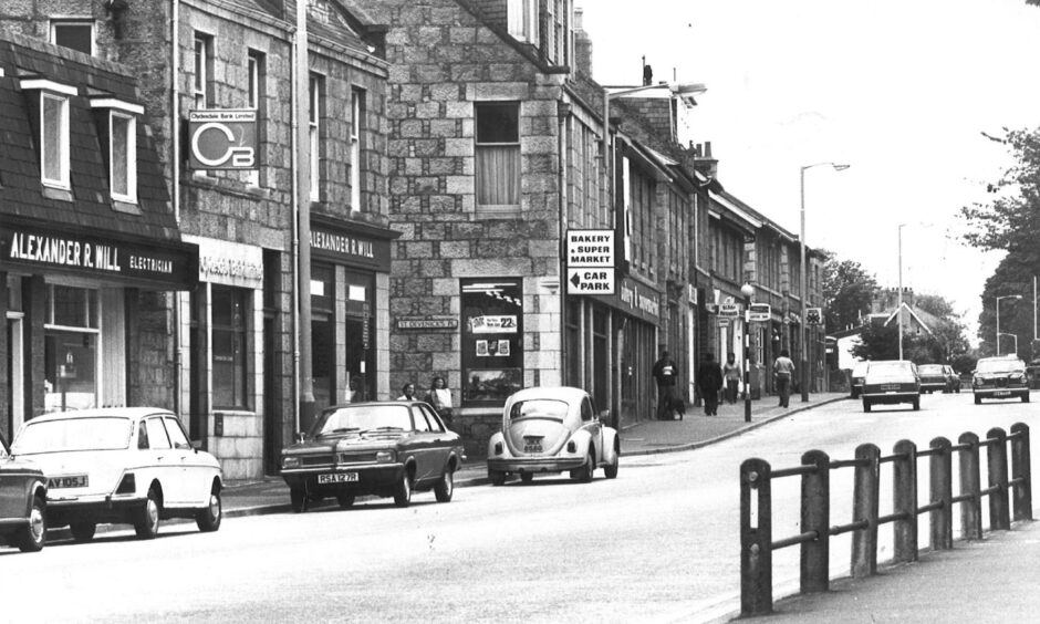 1977: Cars parked along North Deeside Road in Cults on a quiet June day. Image: DC Thomson