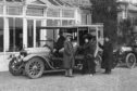 Fraudster Violet Charlesworth in one of her motor cars outside Flowerburn House, Fortrose.