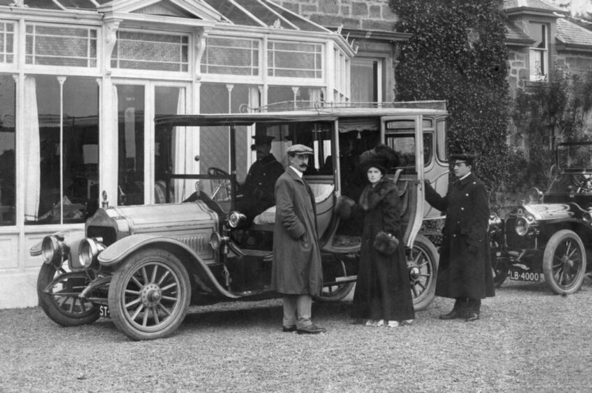 Fraudster Violet Charlesworth in one of her motor cars outside Flowerburn House, Fortrose.