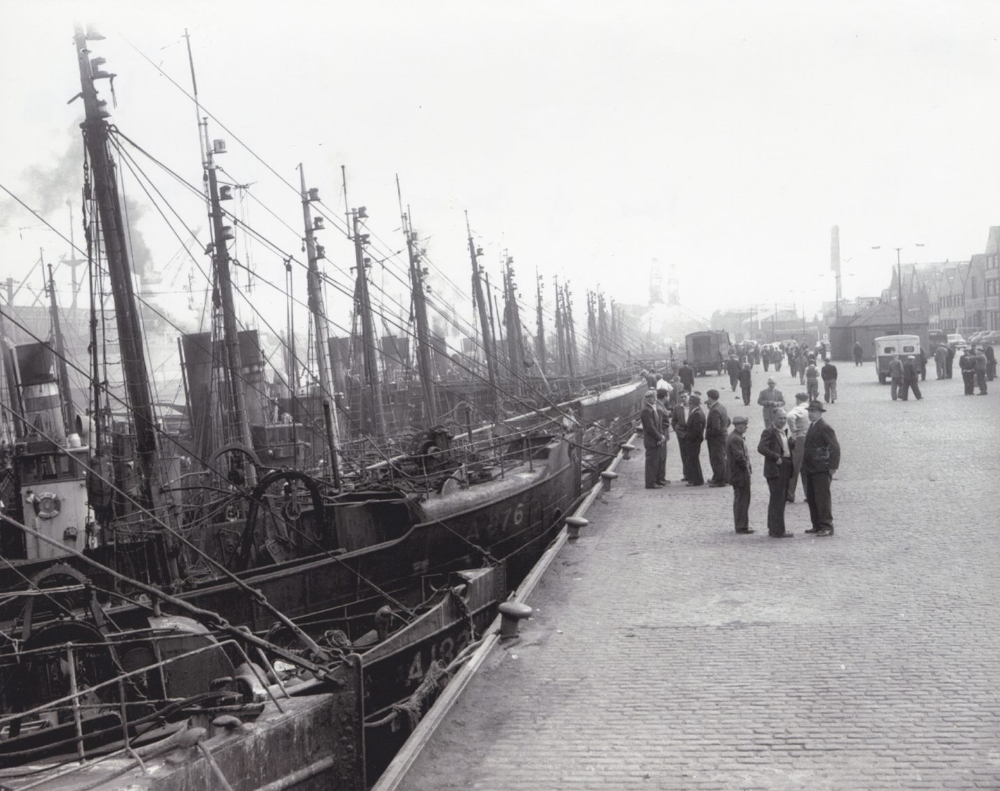 Rows of trawlers line up at Point Law as they wait their crews to return to sea at the height of Aberdeen's success as a major UK fishing port in 1958. 
