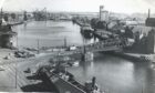 1963: St Clement's Bridge which transported cars across Aberdeen Harbour. The bridge was opened by the Queen Mother in September 1953, but was removed by 1975. Image: DC Thomson