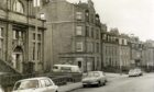 1970: Street view showing Aberdeen Public Library and housing along Victoria Road as set out by City of Aberdeen Land Management in the Victorian era. Image: DC Thomson