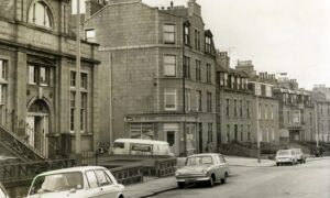 1970: Street view showing Aberdeen Public Library and housing along Victoria Road as set out by City of Aberdeen Land Management in the Victorian era. Image: DC Thomson