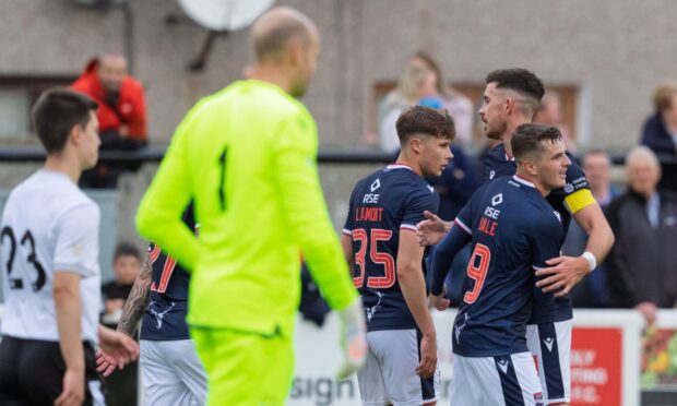 Ross County players celebrate after Ronan Hale (No9) makes it 2-0. Image: Jasperimage.