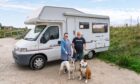Jerry and Sylvia Cross with their two dogs, Ghost and Etta