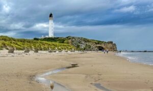 Editor's choice: Lossiemouth East Beach overlooked by Coves Lighthouse. Image: Judith Mcintyre