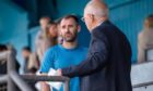 Peterhead signing Niall McGinn in the stands at Balmoor. Image: Darrell Benns/DC Thomson.
