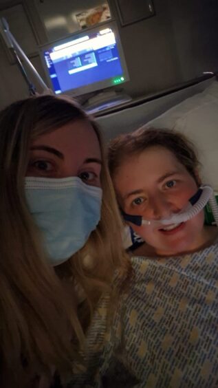 Debielee McKenzie and wife Michelle in the hospital together