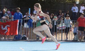 Emily McArthur on running track.