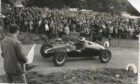 1965: A large crowd turned out to watch the Fintray Hillclimb in Aberdeenshire on September 26 1965. TJ Adair, East Kilbride, in a Cooper Jap, is pictured negotiating a tricky bend. Image: DC Thomson