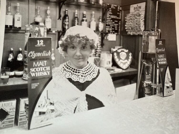 'Grannie' Jeanette McGrath behind the bar