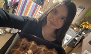 Ava Deighan with some of her home baking. The 16-year-old has battled food allergies her whole life but finds a safe haven in baking. Image: Supplied by Ava Deighan