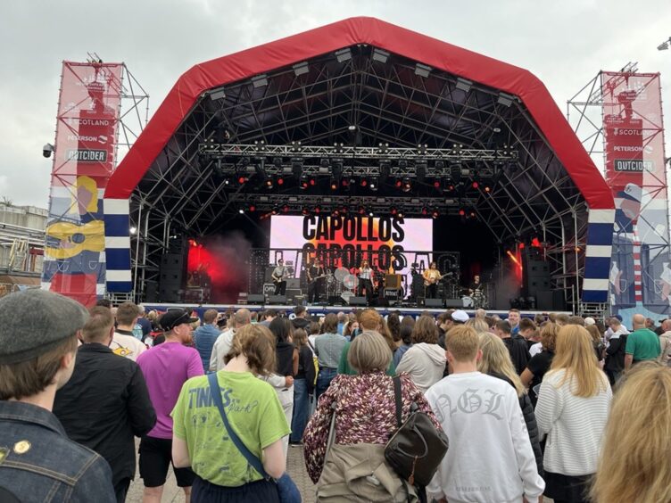 The Capollos on stage