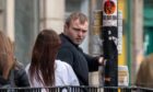 Aiden Boylan outside  Aberdeen Sheriff Court.