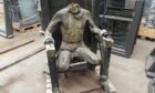 Dummy sitting in electric chair.
