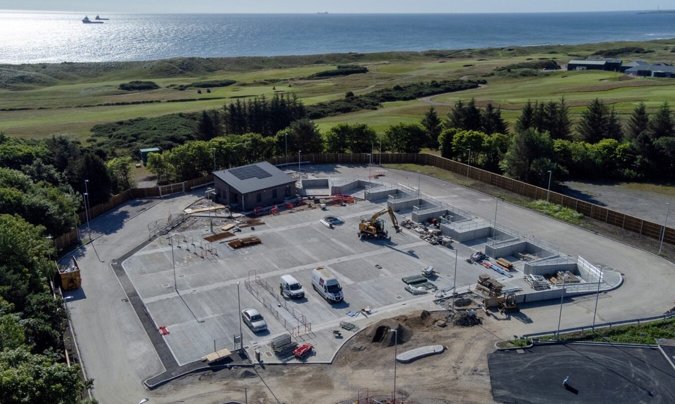 The site is next to the golf course, with the sea in the background