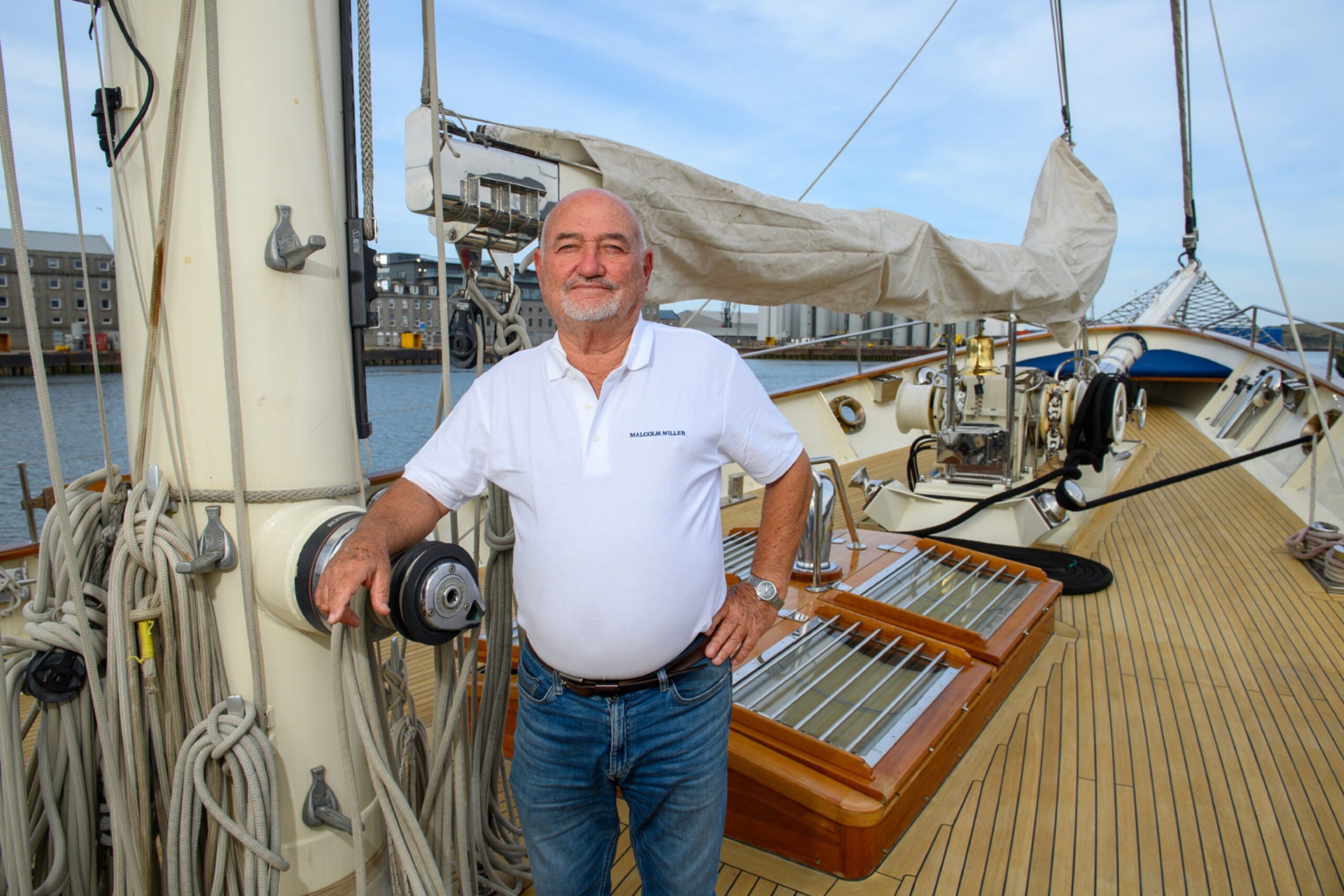 A picture of Ajax Eas, the owner of the ship Malcolm Miller, on the ship's deck.