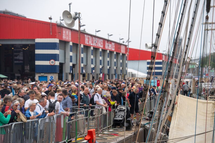 Crowds gathering at the quayside