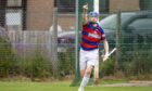 Kingussie's Dylan Borthwick celebrates his goal in the semi final against Newtonmore. Image: Neil Paterson.