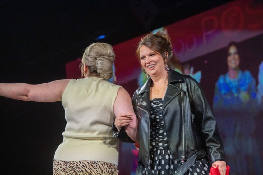 Courage model Kirsteen Deighton is picture on stage during the May 2025 event.