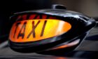 A taxi driver was stabbed in Inverurie after a teenage boy refused to pay his fare. Image: PA.