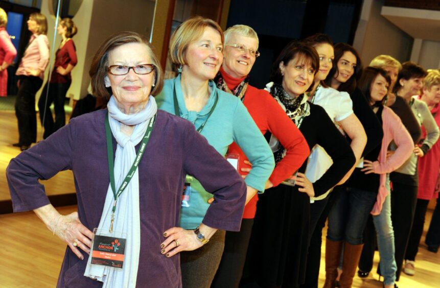 Women who took part in the Courage 2013 event pose at the Aberdeen Beach Ballroom.